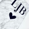 Personalised white marble suitcase with rose gold initials