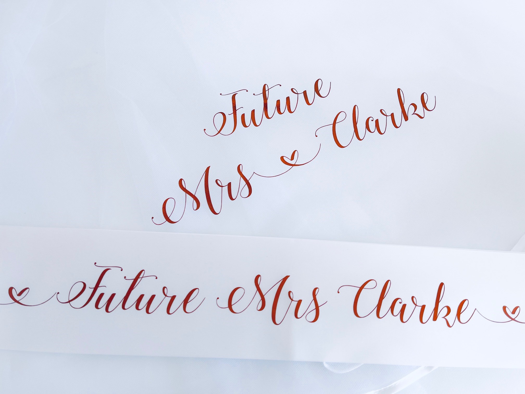 White tulle hen party veil with comb, personalised with “The Future Mrs” text – fun bridal accessory for hen parties and bridal showers.