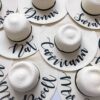 Natural wide brim personalised sun hats with custom names in script font – perfect for hen parties, honeymoons, and beach holidays.