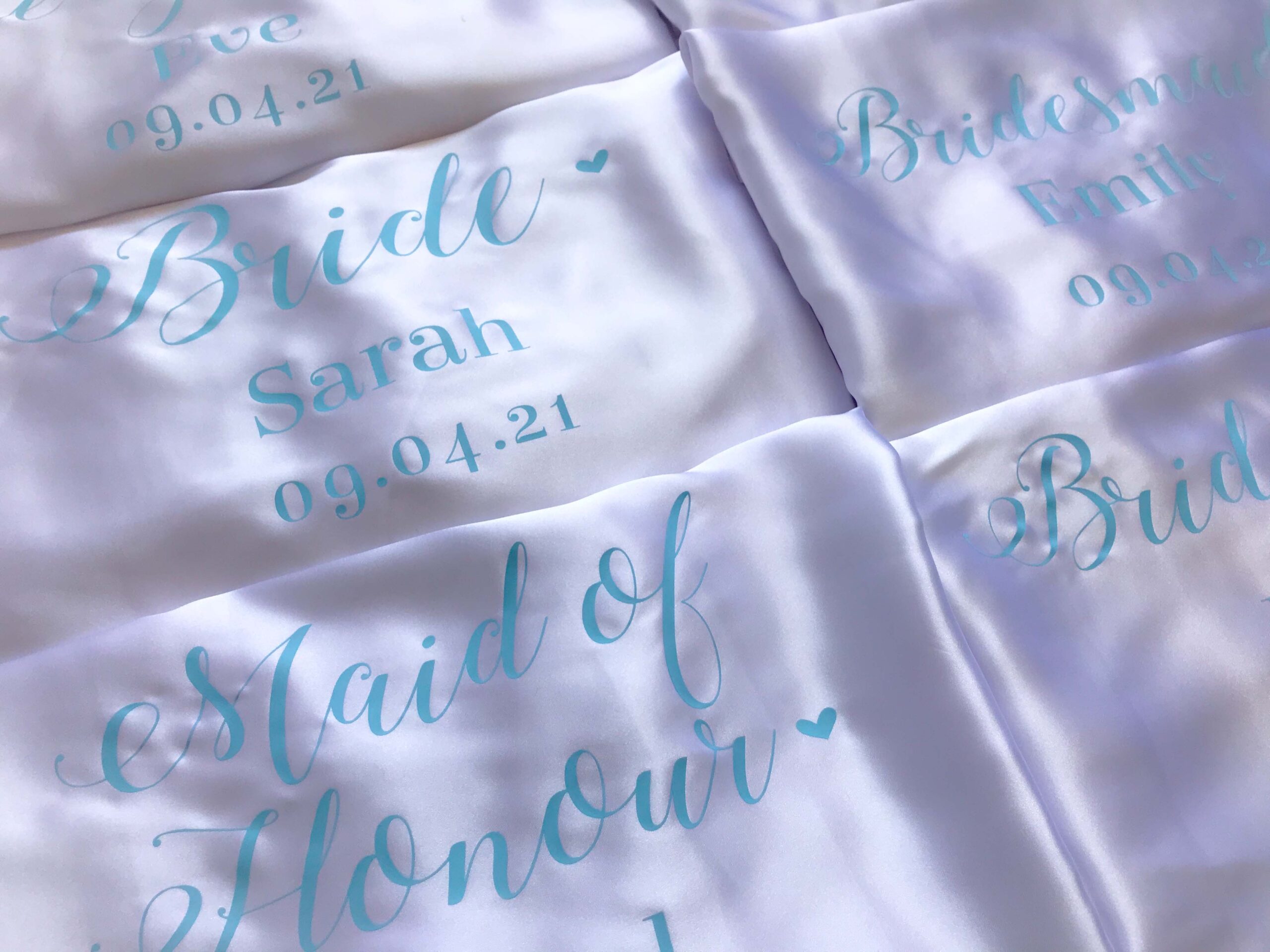 wedding role satin robe with blue text