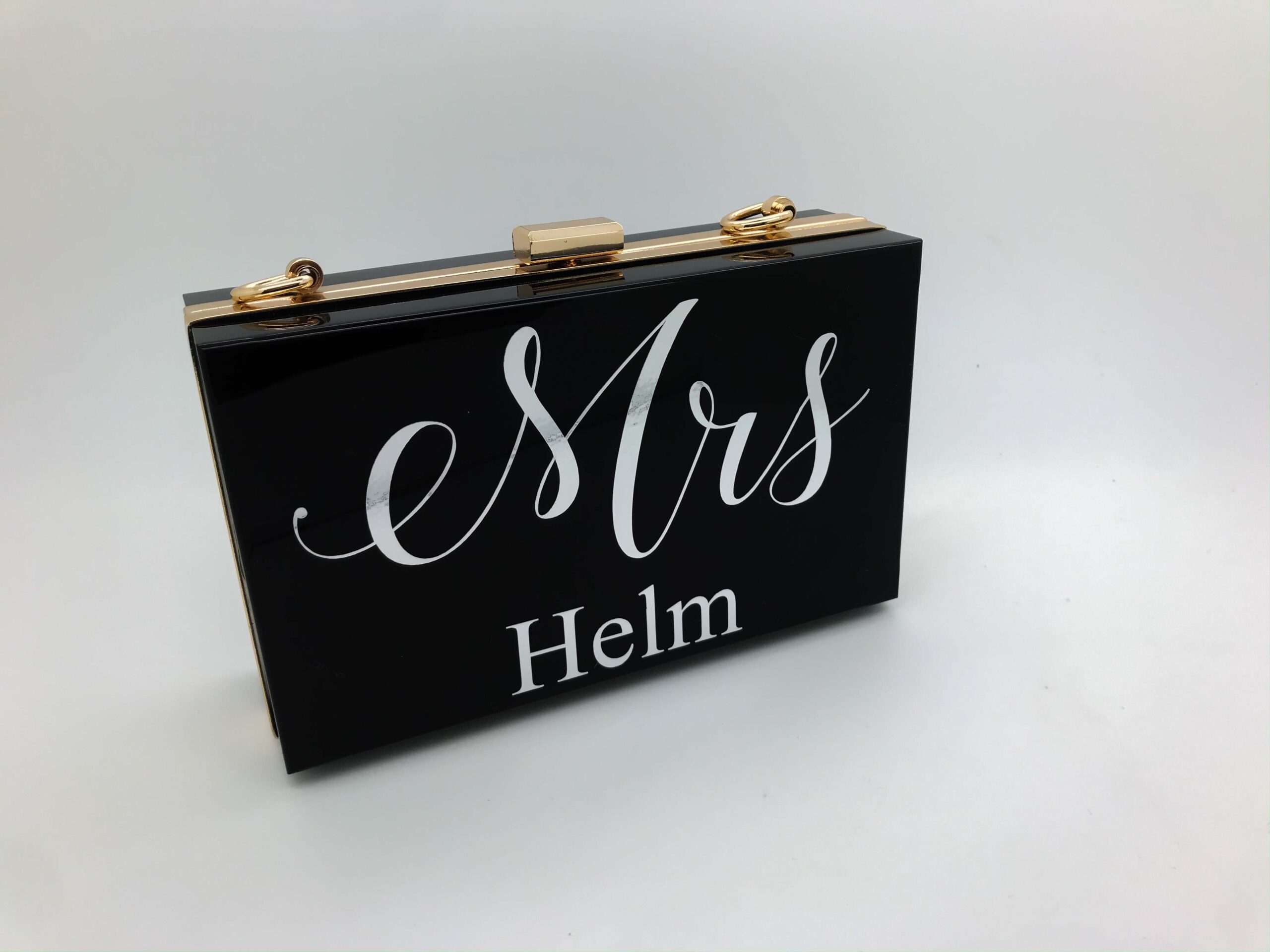personalised black clutch bag with marble writing