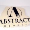 Clear Acrylic Painted Business Sign with custom logo design in black lettering