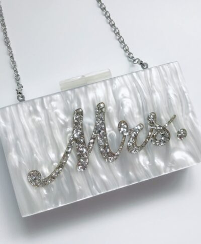 Pearl clutch bag with “Mrs” lettering, elegant bridal handbag for weddings, hen parties, honeymoons, and newlywed gifts.